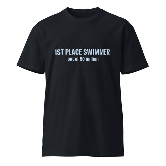 Unisex navy premium T-shirt with 1st Place Swimmer out of 50 million graphic design on front, by wayward.biz.
