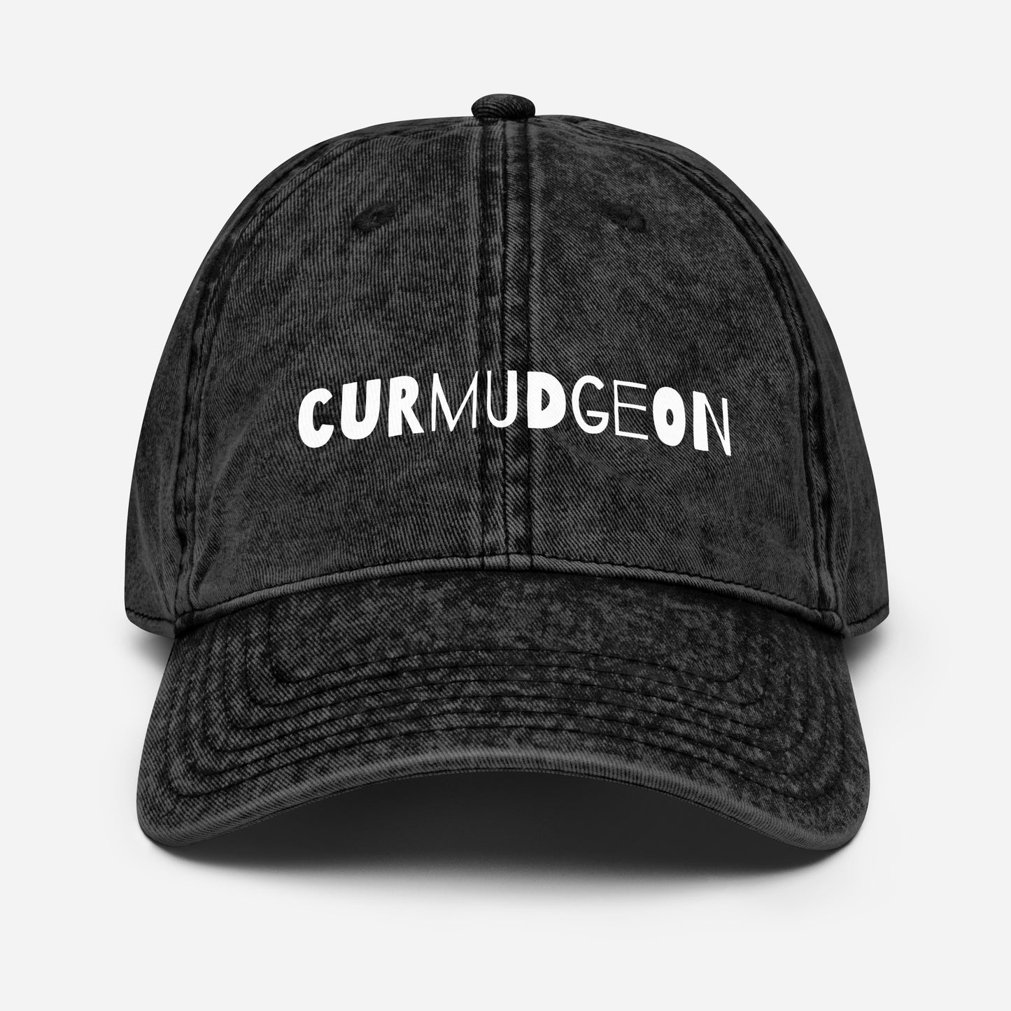 Black vintage cotton twill cap with curved brim, classic style, from Wayward.biz, featuring a worn-in, timeless design.